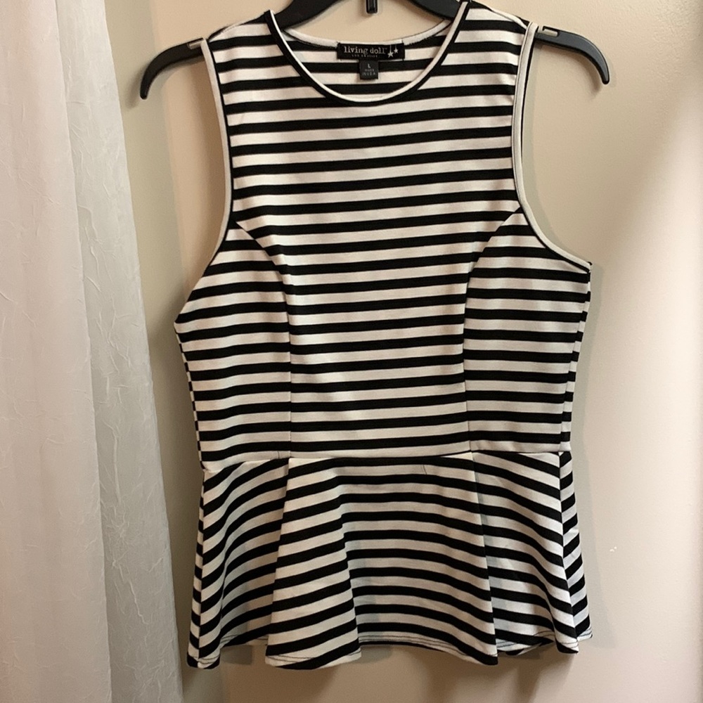 Top size L but runs small
